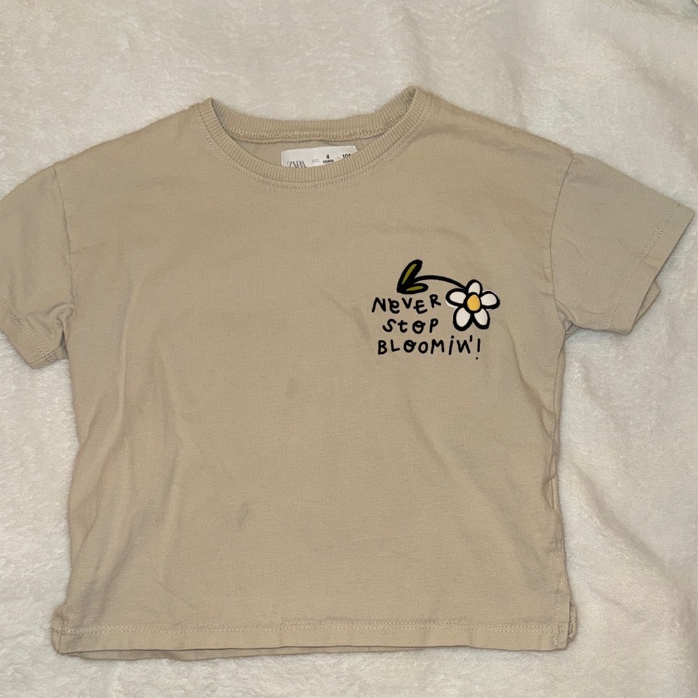 Zara Beige Short Sleeve Tee with Daisy 'Never Stop Bloomin' Graphic